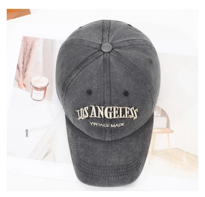 Detailed view of vintage washed charcoal baseball cap with white LOS ANGELES embroidery