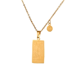 Detailed shot of golden Pisces zodiac tarot rectangle pendant and round charm necklace