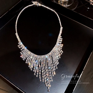 Exaggerated silver rhinestone tassel necklace for women featuring a luxury V-shaped design