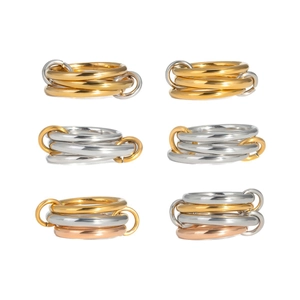 Interlocked stainless steel multi-ring stack set in gold, silver, and rose gold finishes