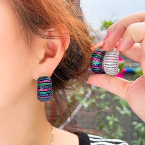 Luxurious C-shaped earrings with colorful gradient zircon rows on a silver needle base