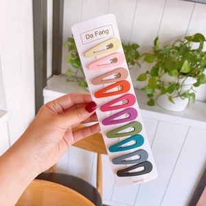 Set of 10 colorful teardrop hair clips displayed on a card for girls' hairstyles