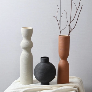 Nordic textured ceramic vases set in white, black and terracotta for home decor