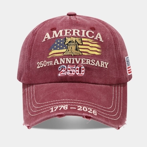 Close-up of vintage washed red baseball cap with America 250th anniversary embroidery