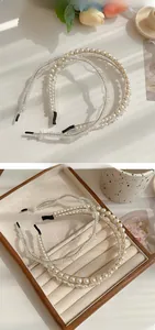 Detail view of handmade double-row pearl and crystal headbands with metal frames