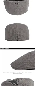 Detailed view of gray corduroy flat cap featuring reinforced brim and metal buckle