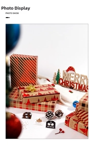 Close-up of Christmas kraft paper with red reindeer patterns and festive gift tags