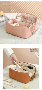 Detail view of large PU leather makeup bag showing internal compartments and elastic slots