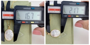Macro shot showing physical dimensions of Virgin Mary shell pendant using digital caliper