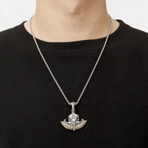 Vintage silver Viking Thor's axe pendant with golden Valknut symbol on woven chain
