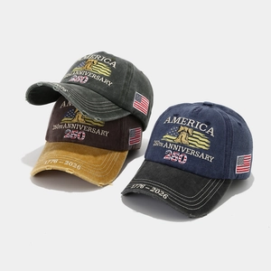 Close-up of America 250th Anniversary embroidery and USA flag patch on washed baseball caps