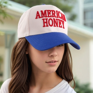 Close-up of American Honey 3D embroidery on a contrast color baseball cap with stitching