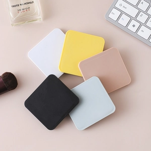 Five portable square folding mirrors in black, white, yellow, beige and blue colors