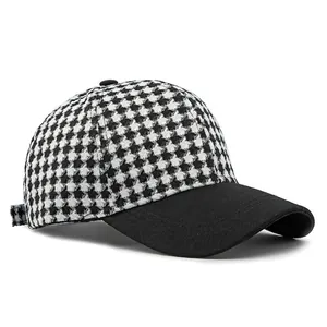 Classic black and white houndstooth baseball cap with a solid black brim for daily wear
