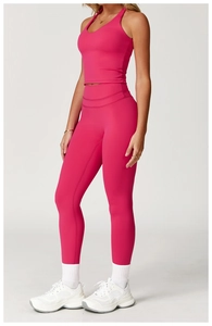 Detail of rose red crisscross back yoga vest and matching high waist gym leggings