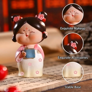 Traditional Tang Dynasty style doll figurine with pink robes and book for desk decoration