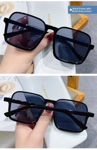 Detail of square black semi-rimless sunglasses with a textured gold-stamped case