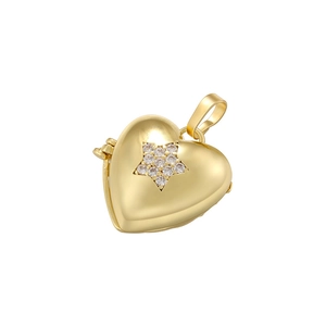 Vintage gold heart locket pendant with a sparkling star-shaped diamond inlay on white background