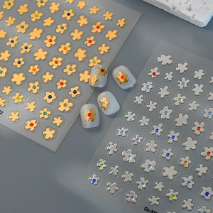 Floral bronzing nail stickers with metallic gold and silver flowers and color gemstone centers