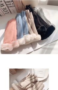 Detail showing plush faux fur cuffs and suede texture on winter touchscreen gloves