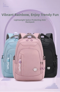 Spinal protection school backpacks shown in pink, blue, and black for students