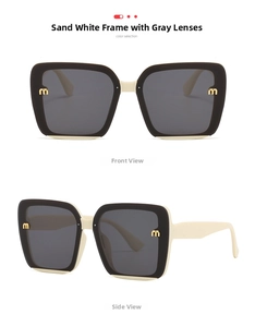 Detail of matte cream sunglasses with dark grey lenses and metal letter M accents