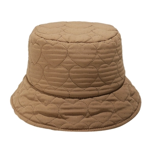 Close-up of khaki quilted bucket hat featuring heart-shaped stitching and gold glitter thread