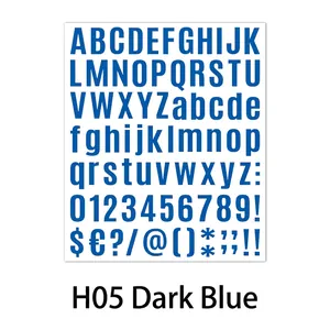 Close-up of dark blue alphanumeric stickers featuring letters, numbers and symbols