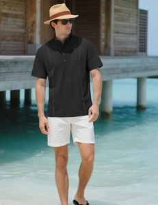 Close-up of black Guayabera-style polo with vertical stripes and high-quality fabric texture