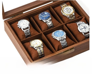 Detail view of 6-slot wood watch box with brown velvet pillows and clear lid display