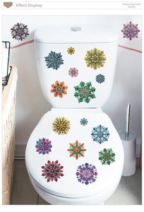 Detail of colorful mandala toilet stickers set on bathroom tank and lid