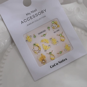 3D embossed nail art stickers with gold floral accents, rhinestones and frame charms