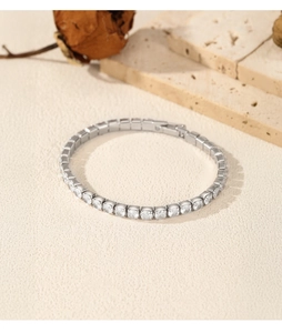 Close-up of sparkling S925 sterling silver tennis bracelet with round cubic zirconia