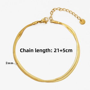 Detail of 2mm wide double-layered gold snake chain showing lobster clasp and 21+5cm length