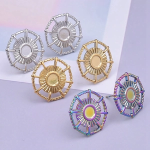 Close-up of 304 stainless steel stud earrings in silver, gold, and rainbow finishes