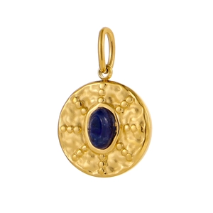 Detailed macro view of vintage round gold pendant with oval blue gemstone and hammered texture