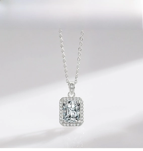 Macro shot of 925 sterling silver necklace with rectangle halo simulated diamond pendant
