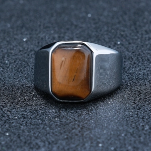 Men's vintage stainless steel signet ring featuring a rectangular tiger eye stone inlay