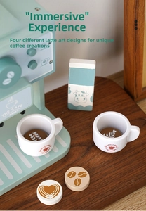 Detail view of wooden coffee machine toy set with mint green maker and latte art discs