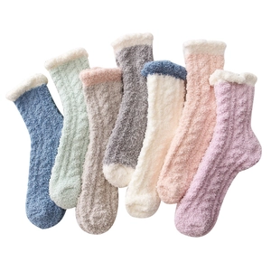 Set of seven colorful thick coral fleece socks with twist knit pattern and contrast toe colors