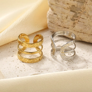 Vintage three-layer embossed open rings in gold and silver finish with hammered texture