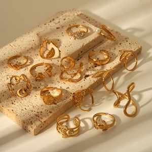 Adjustable gold plated stainless steel rings set with pearls and crystals