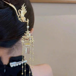 Épingle à cheveux chinoise traditionnelle dorée avec pompons et perles sur coiffure