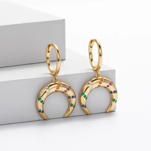 Detailed close-up of S925 silver crescent earrings with colorful pave zircon stones