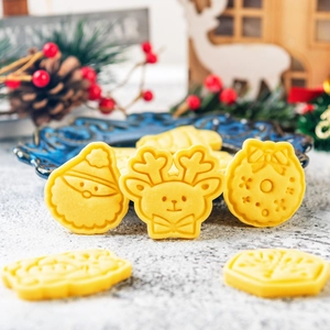 Japanese style DIY Christmas cookie cutters set showing various embossed cartoon shapes