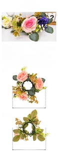 Detailed size specifications for a 27cm artificial rose wreath for festive decoration