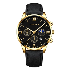 Detail of luxury gold quartz watch with black roman dial, date window and leather strap