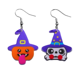 Detail of Halloween acrylic earrings featuring cute cartoon pumpkin and ghost with wizard hats
