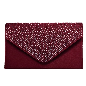 Detail of burgundy satin evening clutch with pleated texture and V-shaped rhinestone trim