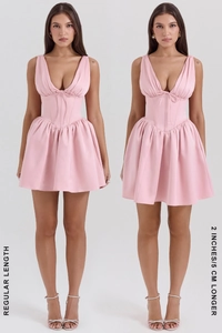 Detail view comparing regular and five centimeter longer pink mini dress lengths